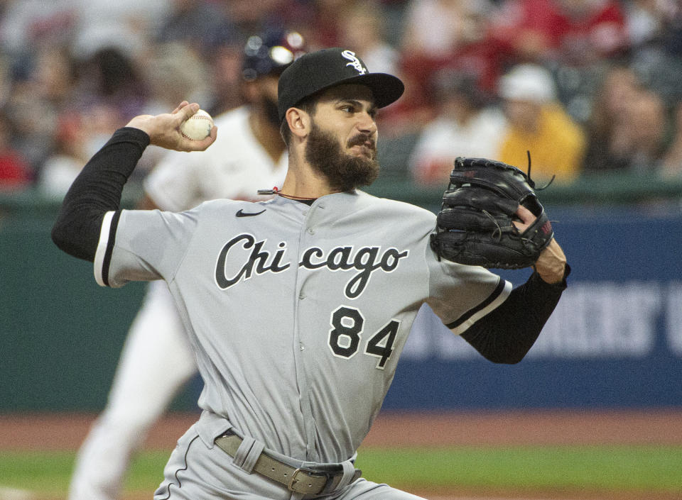 Chicago White Sox starting pitcher Dylan Cease delivers against the Cleveland Indians during the first inning of a baseball game in Cleveland, Friday, Sept. 24, 2021. (AP Photo/Phil Long)