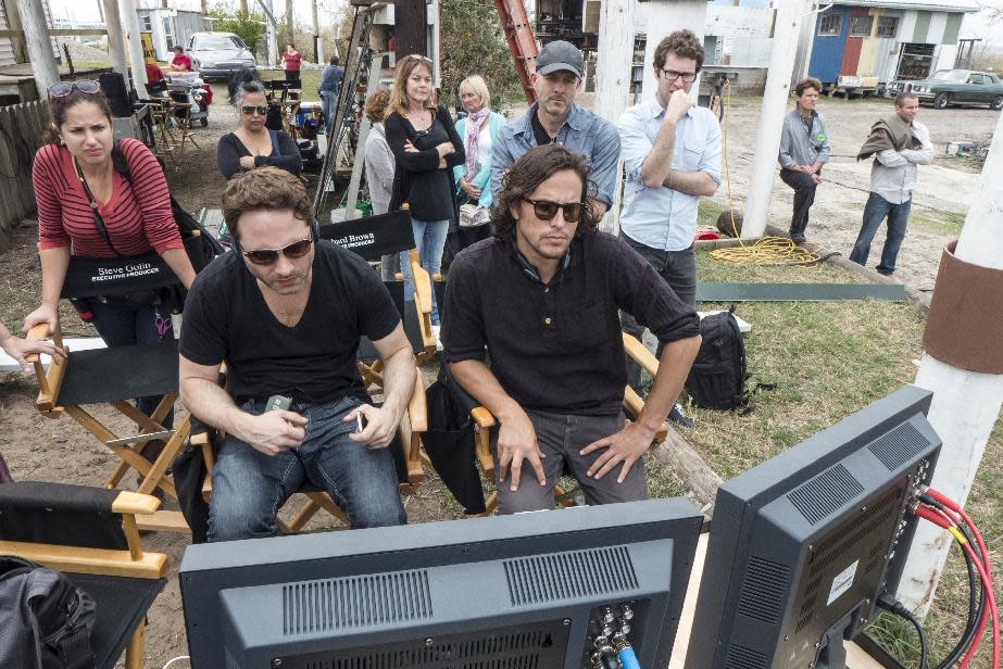 This undated image released by HBO shows writer and executive producer Nic Pizzolatto, left, and director Cary Fukunaga on the set of "True Detective," a series new premiering premiering Jan. 12, at 9 p.m. EST. (AP Photo/HBO, Jim Bridges)