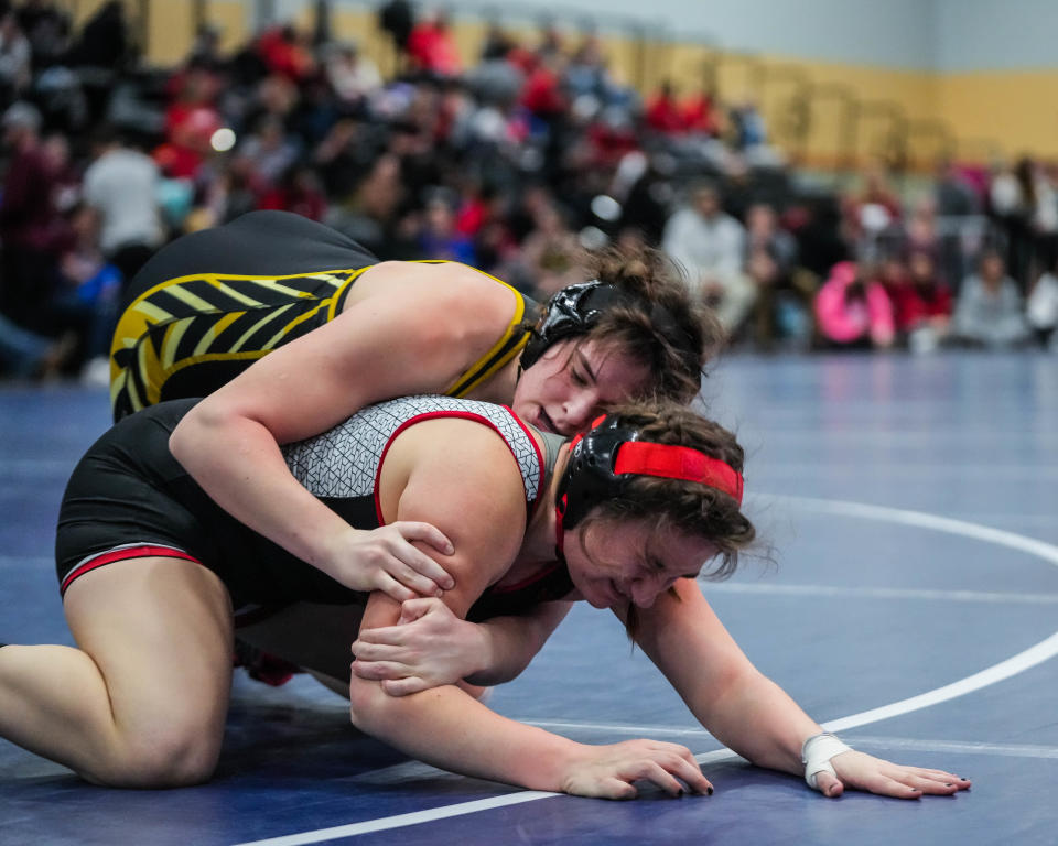 West Marshall’s Averie Wittkop wrestles Newton’s Jessie Hutchinson at 170 pounds during the championship round of the IGHSAU Regional Qualifier earlier this season.