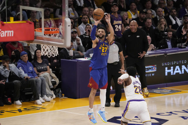 Denver Nuggets guard Jamal Murray (27) shoots against the Los Angeles Lakers in the second half of Game 3 of the NBA basketball Western Conference Final series Saturday, May 20, 2023, in Los Angeles. (AP Photo/Mark J. Terrill)