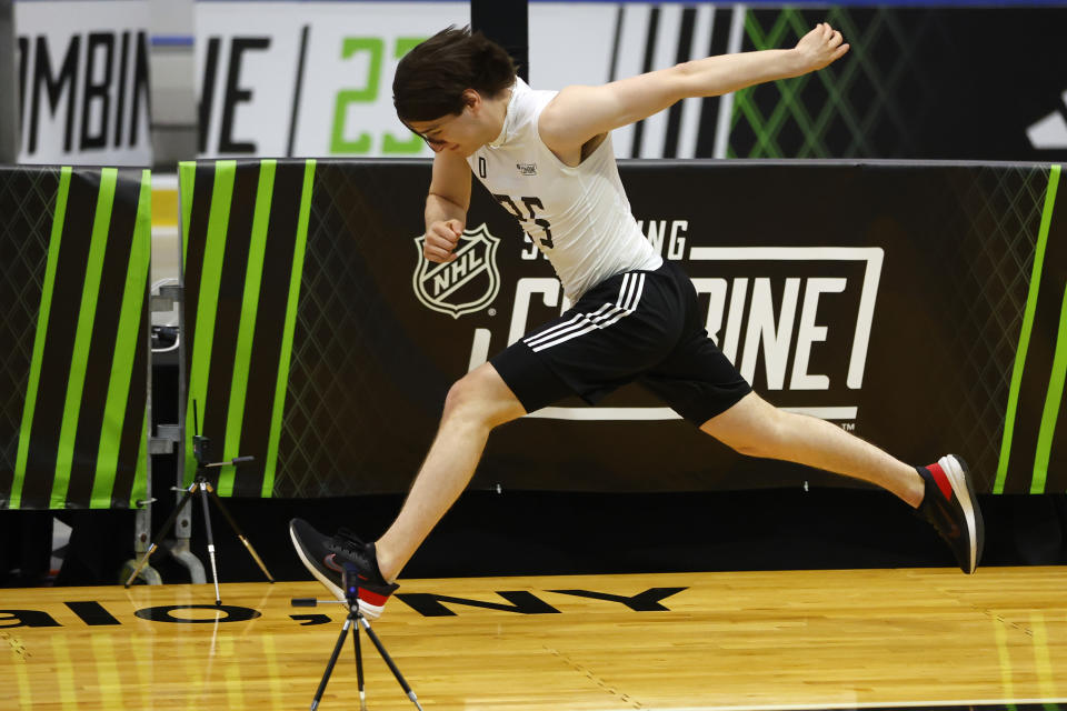 FILE - Defenseman Etienne Morin, a top draft prospect, runs the agility course during the NHL hockey combine, Saturday, June 10, 2023, in Buffalo, N.Y. In an NHL draft class dominated by skilled forwards, and led by Connor Bedard, questions arise over who and when the first defenseman will be selected when the first round is held in Nashville on Wednesday night. (AP Photo/Jeffrey T. Barnes, File)