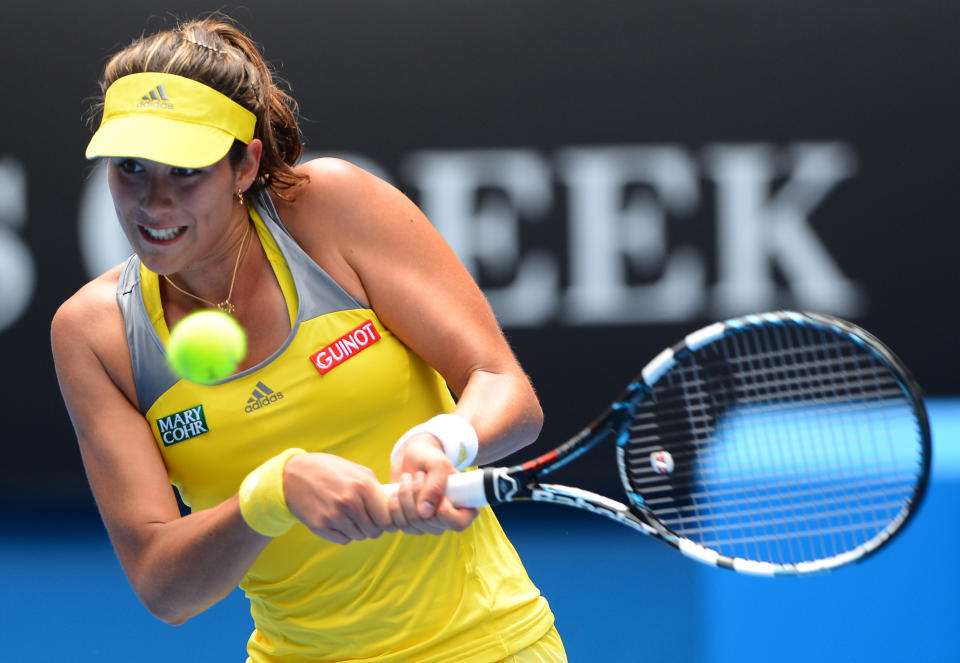 Garbine Muguruza of Spain plays a return during her women's singles match against Serena Williams of the US on the fourth day of the Australian Open tennis tournament in Melbourne on January 17, 2013.  