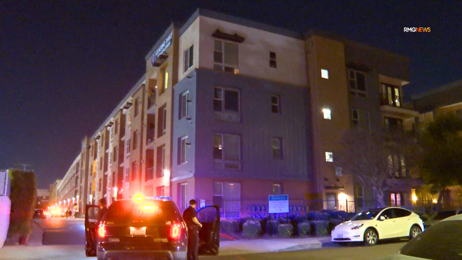 Police respond to a shooting at the Reveal Apartments in Los Angeles on April 2, 2024.