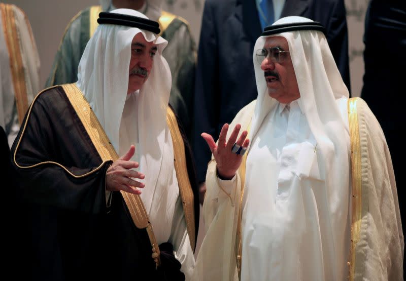 FILE PHOTO: UAE Finance Minister and Deputy Ruler of Dubai Sheikh Hamdan bin Rashid Al Maktoum speaks to Saudi Arabia's Finance Minister Ibrahim al-Assaf ahead of a group meeting of Gulf and Arab Finance Ministers in Abu Dhabi