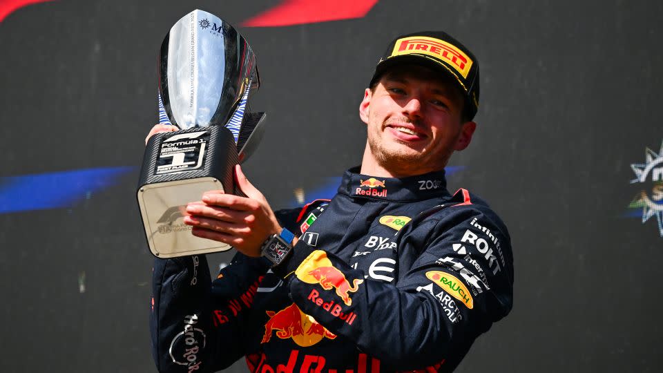 Verstappen celebrates on the podium. - Dan Mullan/Getty Images