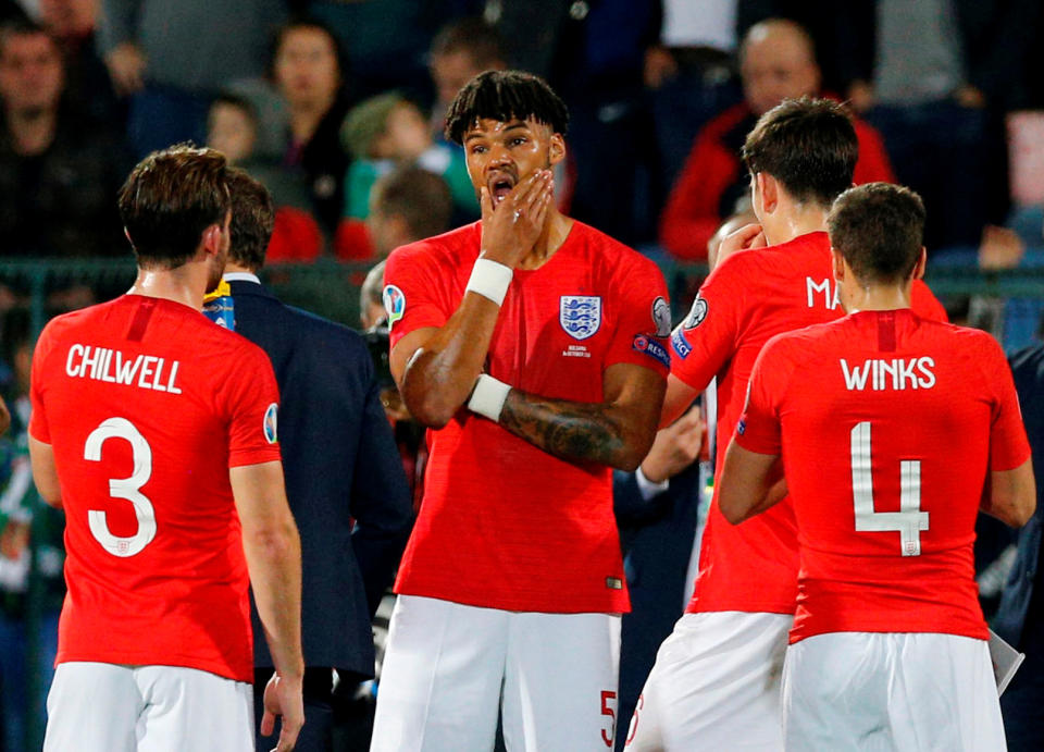 Soccer Football - Euro 2020 Qualifier - Group A - Bulgaria v England - Vasil Levski National Stadium, Sofia, Bulgaria - October 14, 2019  England's Tyrone Mings and teammates as the match is temporarily stopped during the first half  REUTERS/Anton Uzunov