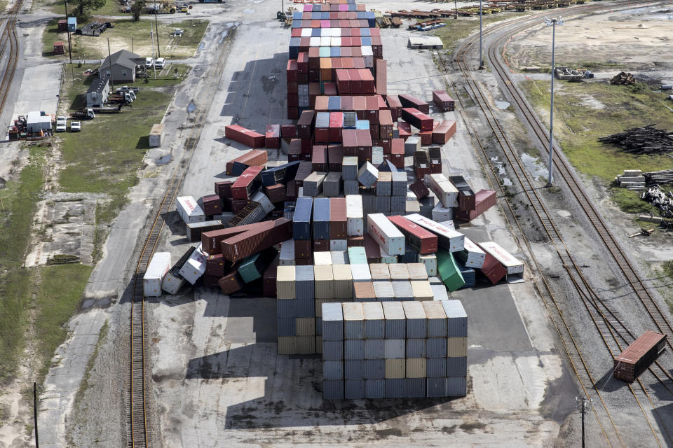 Damaged and fallen shipping containers are seen at Portwatch Industrial Park in Wilmington, North Carolina.&nbsp;