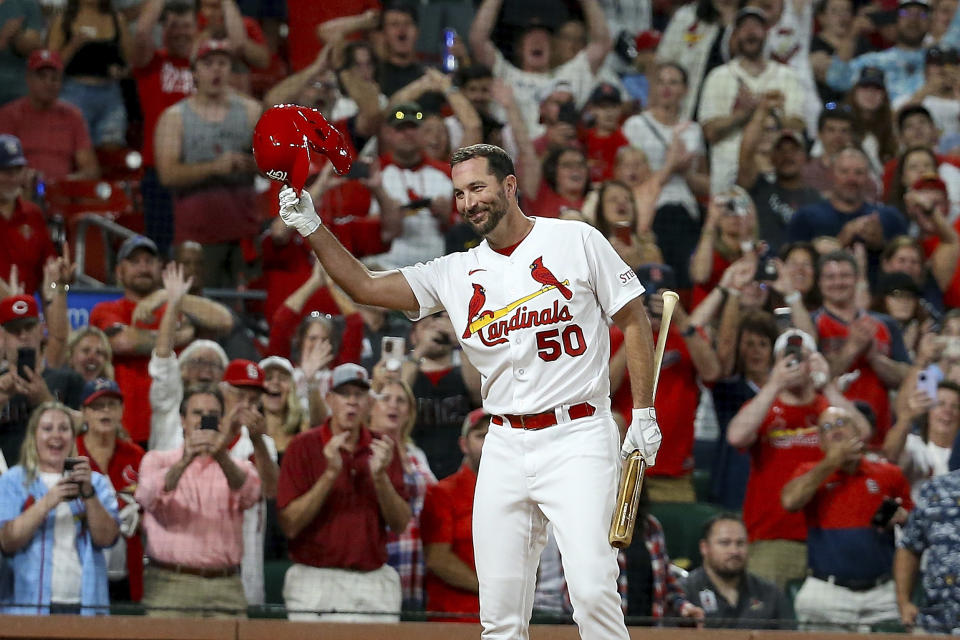 St. Louis Cardinals' Adam Wainwright acknowledges fans as he prepares to pinch hit during the sixth inning of a baseball game against the Cincinnati Reds, Friday, Sept. 29, 2023, in St. Louis. (AP Photo/Scott Kane)