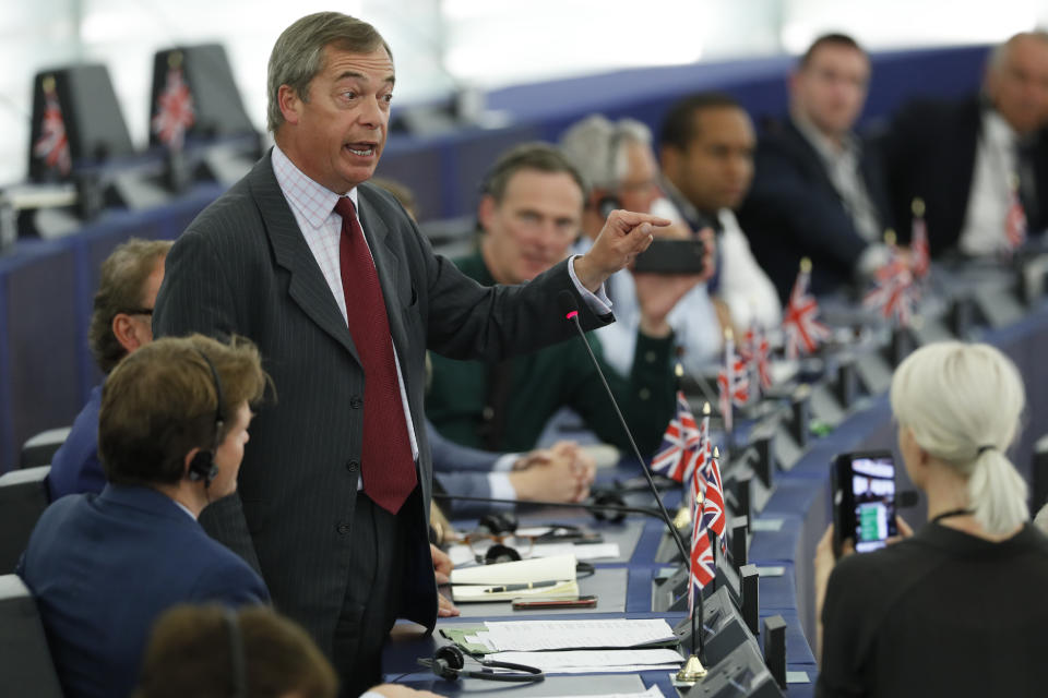 Brexit Party chairman Nigel Farage, center, speaks during a debate at the European Parliament in Strasbourg, eastern France, Tuesday July 16, 2019. Outgoing German defense minister Ursula von der Leyen is seeking to woo enough legislators at the European Parliament to secure the job of European Commission President in a secret vote late Tuesday. (AP Photo/Jean-Francois Badias)