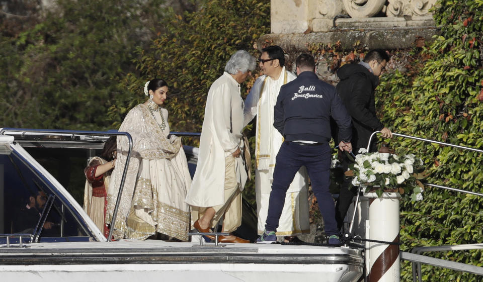 Guests arrive to attend the wedding of Indian Bollywood stars Deepika Padukone and Ranveer Singh at the Villa Balbianello in Lenno, Como lake, northern Italy, Wednesday, Nov. 14, 2018. Wednesday’s nuptials at Villa Balbianello, a lakeside mansion featured in Star Wars and James Bond films, came on the fifth anniversary of the release of their first movie together. (AP Photo/Luca Bruno)