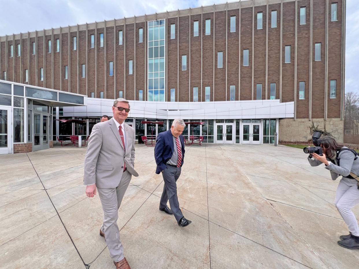 Ohio State University President Walter "Ted" Carter Jr. leaves Ovalwood Hall in Mansfield after touring the Pearl Conard Art Gallery.