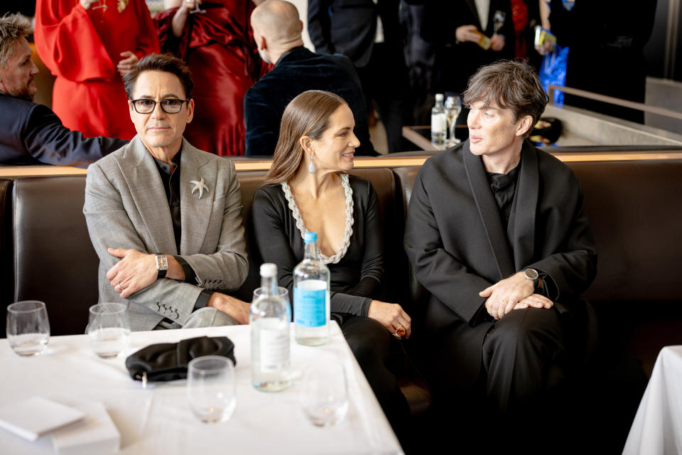 Robert Downey Jr., su esposa Susan Downey y Cillian Murphy durante una recepción de los BAFTA Film Awards 2024 en Londres (Photo by Carlo Paloni/BAFTA via Getty Images)