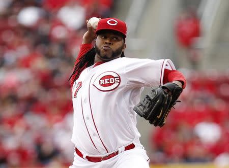 Cincinnati Reds starting pitcher Johnny Cueto (47) pitches during the first inning against the Pittsburgh Pirates at Great American Ball Park. Mandatory Credit: Frank Victores-USA TODAY Sports