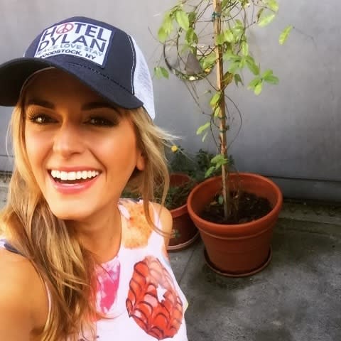 Sims made the first move on Koepka when she sent him this pic in 2015. “I had this selfie of me in my apartment in LA and I had a plant that was behind me and it was twiggy. It had died. I said, ‘Does this filter make my plant look tan?’” Courtesy of Jena Sims