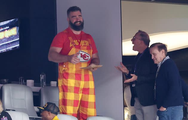 Jason Kelce cheered for his brother, Travis Kelce, wearing very flashy checkered overalls.