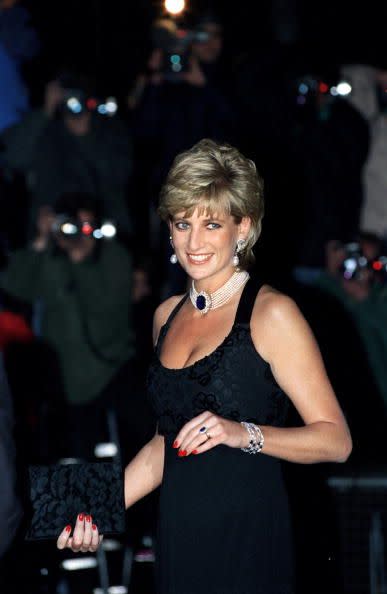 <p>Princess Diana received a giant sapphire brooch as a gift from the Queen Mother and fashioned it into a multi-strand pearl choker, which she wore on several occasions throughout the '90s—here, she attends a London gala in 1995.</p>