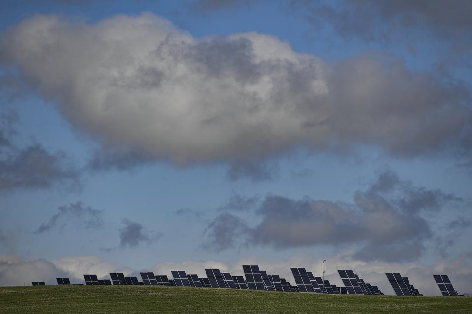 FILE - This photo shows solar panels on a solar park in Los Arcos, Navarra Province, northern Spain, on Feb. 24, 2023. Renewable energy investors suing Spain will return to a London court this week, attempting to claw back $125 million from a decade-long dispute with ramifications for clean energy financing across the European Union. (AP Photo/Alvaro Barrientos, File)