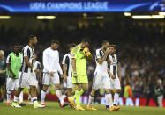 FILE - In this Saturday June 3, 2017 file photo Juventus goalkeeper Gianluigi Buffon and Juventus' Giorgio Chiellini react at the end of the Champions League final soccer match between Juventus and Real Madrid at the Millennium stadium in Cardiff, Wales. I is for Italy. Despite as a country having the third highest number of wins in the history of European Cup, Italy also holds the honor of most defeats in the final. 16 in all. Juventus have lost 7 of the 9 finals they have played in. (AP Photo/Dave Thompson, File)