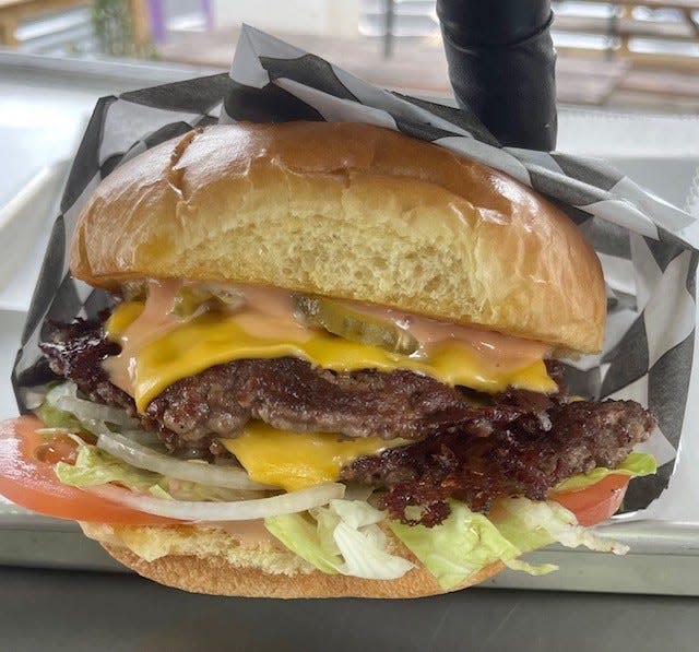 Iron Sharpens Iron, a new local food truck, offers a double stacked cheese smash burger as a regular menu item.