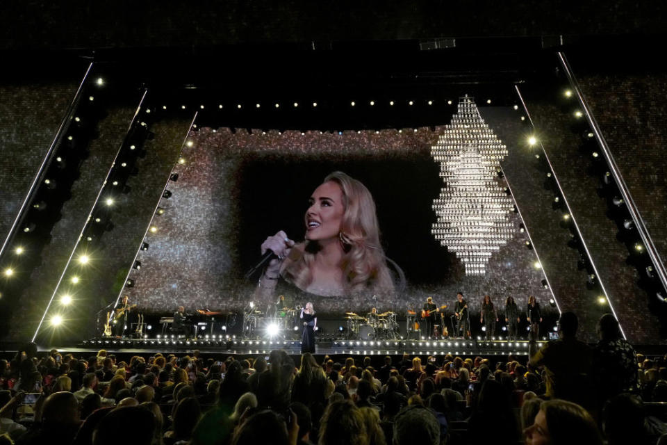 Adele performs onstage. Photo by Kevin Mazur/Getty Images for AD