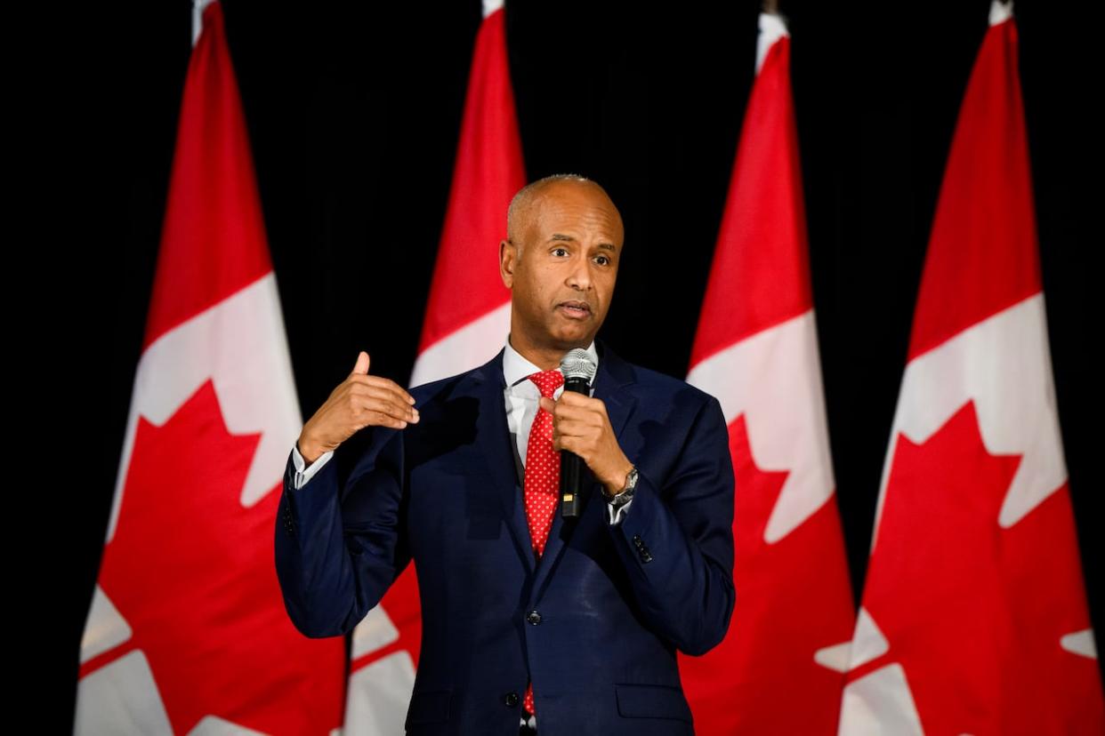 Minister of International Development Ahmed Hussen delivers remarks at a fundraiser event, in Toronto. Hussen is expected to make an announcement on Wednesday. (Christopher Katsarov/The Canadian Press - image credit)
