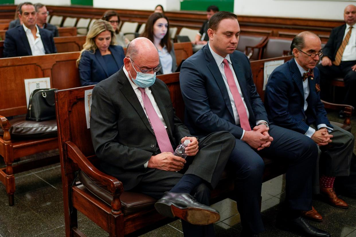 Alan Weisselberg (left), Donald Trump’s longtime finance chief, sits inside New York Supreme Court, on 10 October 2023 (AP)