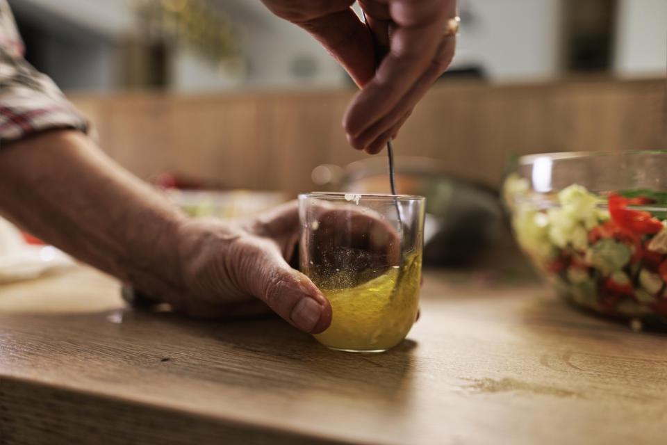 Preparing lemon dressing.