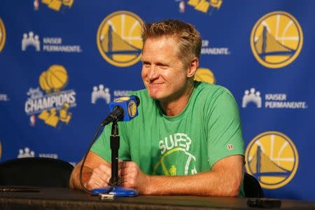 FILE PHOTO: Oct 5, 2018; Seattle, WA, USA; Golden State Warriors head coach Steve Kerr answers questions at a press conference while wearing a Seattle Supersonics t-shirt before a game against the Sacramento Kings at KeyArena. Mandatory Credit: Joe Nicholson-USA TODAY Sports/File Photo