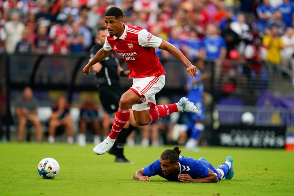 Arsenal forward William Saliba, top, leaps over Everton forward Dominic Calvert-Lewin while competing for the ball during the first half of a pre-season friendly soccer match, Saturday, July 16, 2022, in Baltimore (AP)