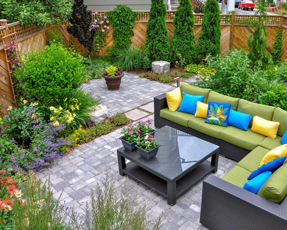 <p> If you've seen our backyard patio ideas, you'll know that this is a winning approach when it comes to transforming a yard. And, there are lots of different types of pavers to choose from, with plenty of choice for smaller budgets. </p> <p> Paving offers a smart and stable base for all your garden furniture, so it's a brilliant option if you love to entertain outdoors. Keep the scheme simple with a comfy corner sofa and coffee table, or to really ramp up the cozy factor, bring in a fire pit. </p> <p> Beautiful flowerbeds can be positioned to break up zones. Stick to a tonal palette for a harmonious look or embrace a riot of color – whichever suits you best. </p>