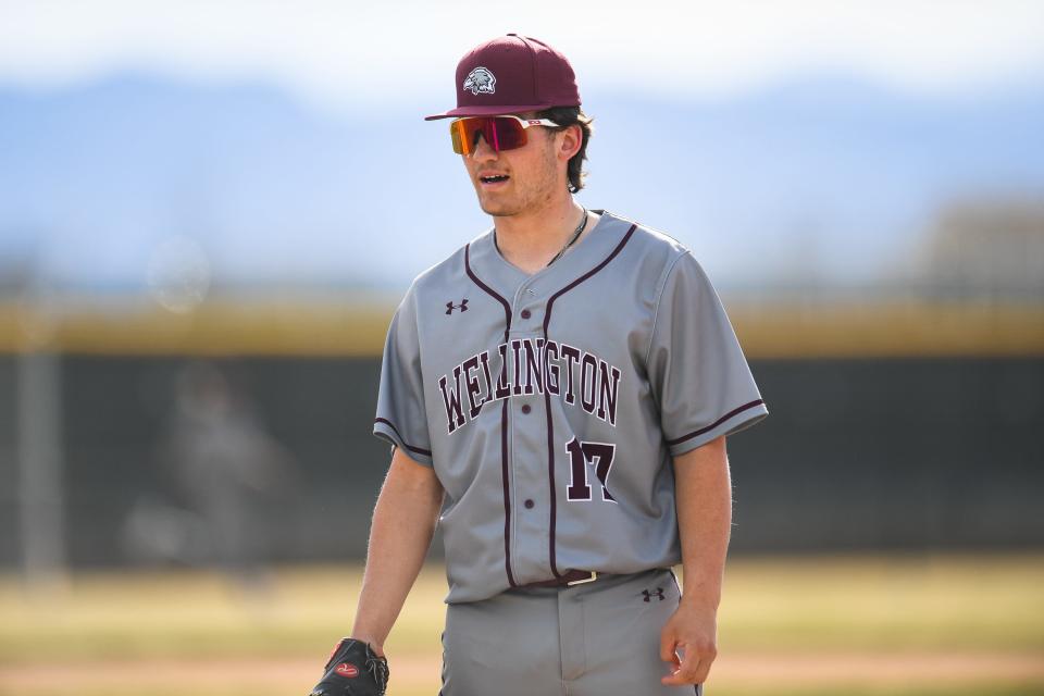 Wellington's Parker Jimenez (17) plays first base during a high school baseball game against Timnath at Timnath Middle-High School on April 12, 2023.