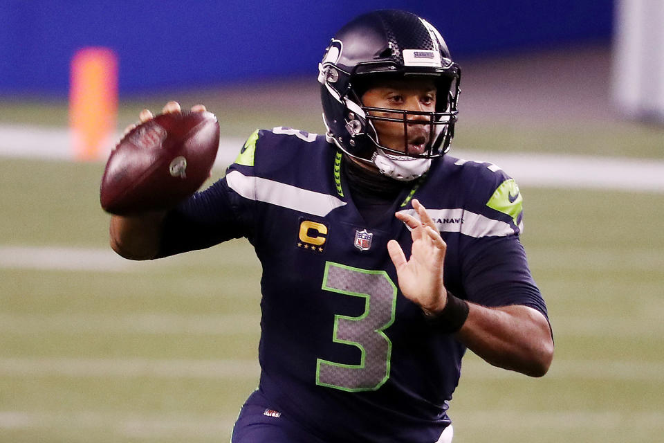 Russell Wilson #3 of the Seattle Seahawks looks to pass during the second half against the New England Patriots at CenturyLink Field on September 20, 2020 in Seattle, Washington. (Photo by Abbie Parr/Getty Images)