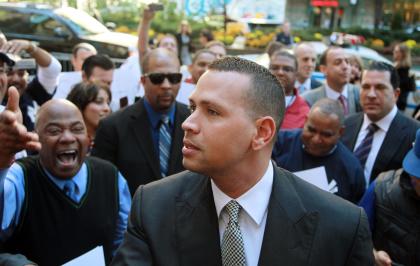 Alex Rodriguez arrives at the offices of Major League Baseball in New York in 2013. (AP file photo)