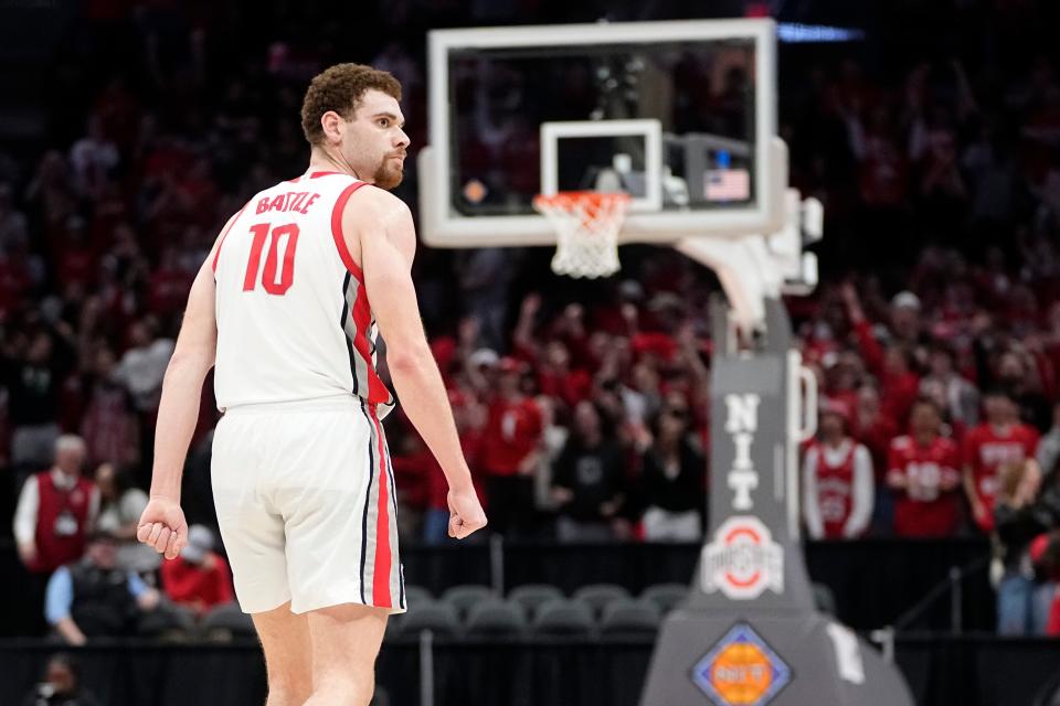 Ohio State forward Jamison Battle celebrates a three pointer during the second half of the Tuesday's 79-77 loss to Georgia in the NIT quarterfinals.