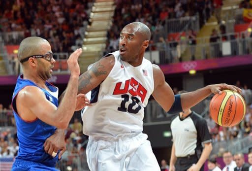 US guard Kobe Bryant (R) is challenged by French guard Tony Parker during the Men's Preliminary Round Group A match United States vs France at the London 2012 Olympic Games in London. With US First Lady Michelle Obama and a host of top US Olympic athletes watching them, the American collection of NBA stars sent a message to Olympic rivals -- we're ready for you