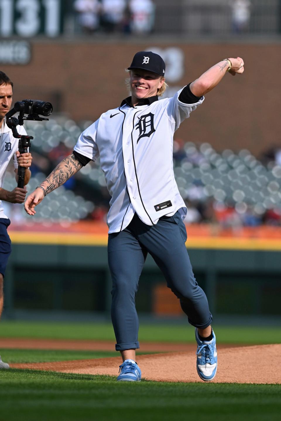 Tigers first-round draft pick Max Clark throws out the first pitch before the Tigers game against the Padres at Comerica Park on Friday, July 21, 2023.