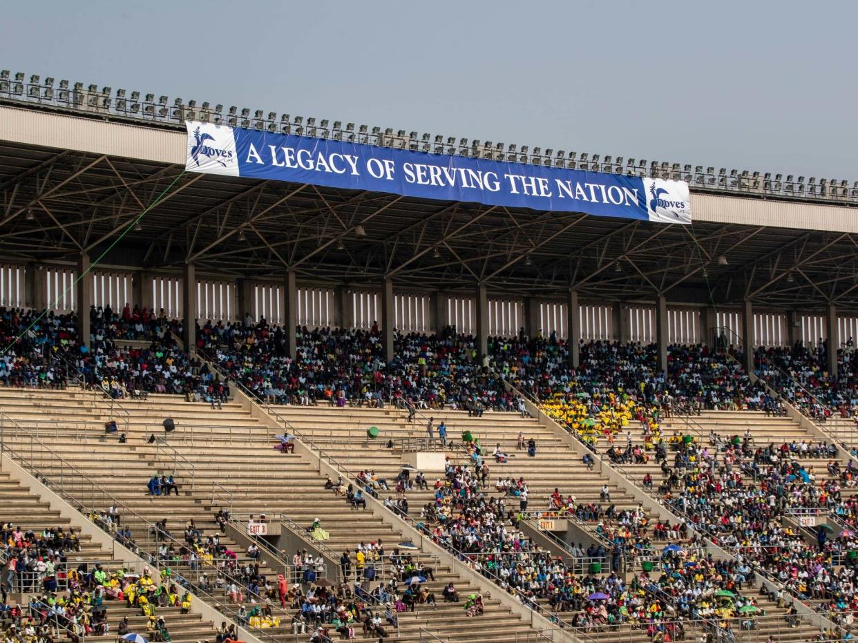 Members of the public sit in the stands during the state funeral for former president Robert Mugabe: AP