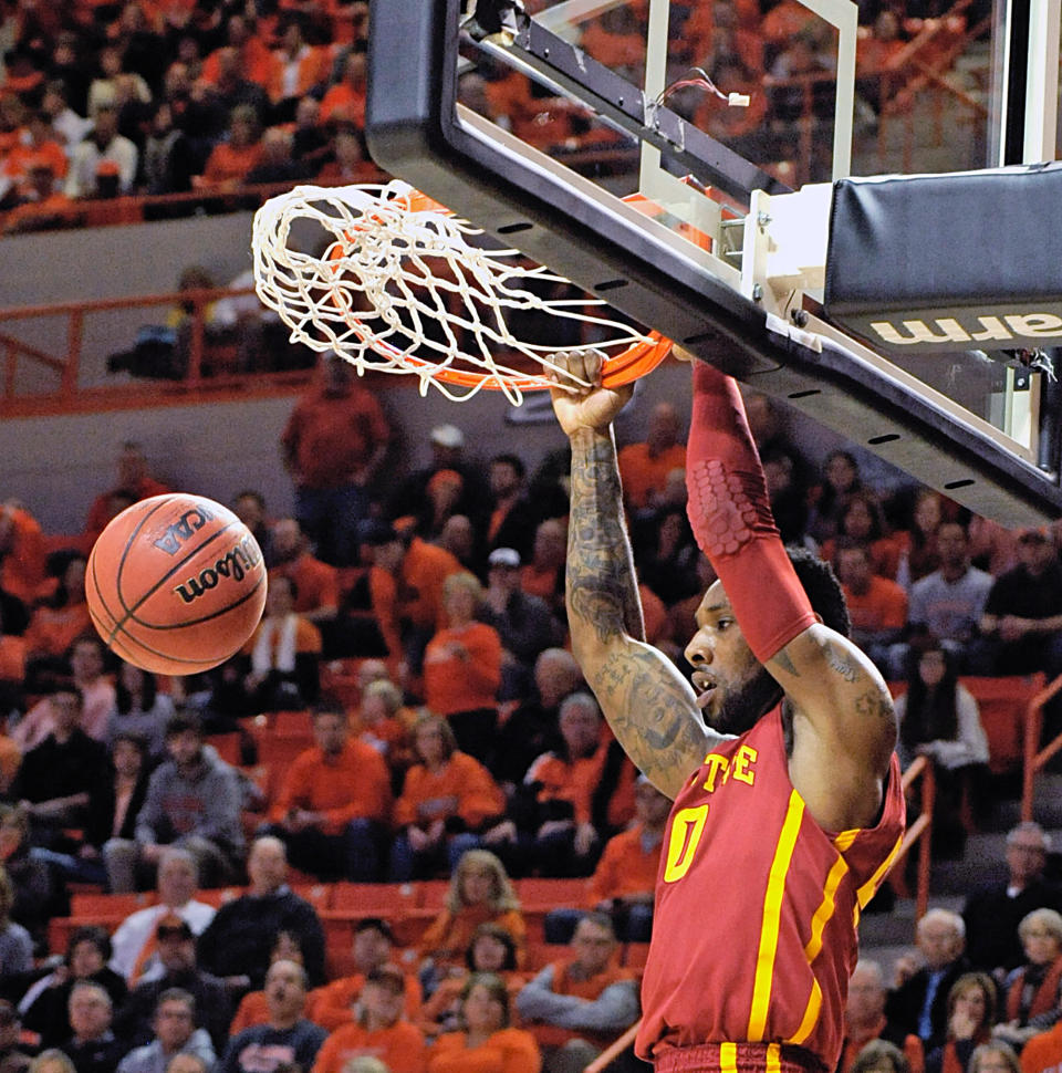 Iowa State's DeAndre Kane dunks the ball during the first half of an NCAA college basketball game in Stillwater, Okla., Monday, Feb. 3, 2014. (AP Photo/Brody Schmidt)