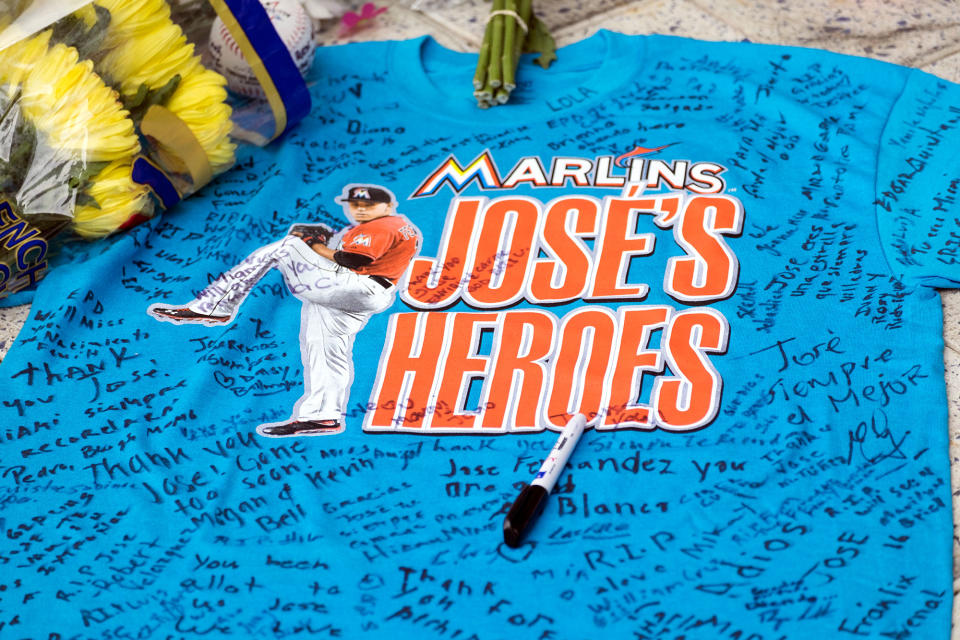 <p>A remembrance shirt at a makeshift memorial in honor of Jose Fernandez sits outside Marlins Park, Sunday, Sept. 25, 2016. (AP Photo/Gaston De Cardenas) </p>