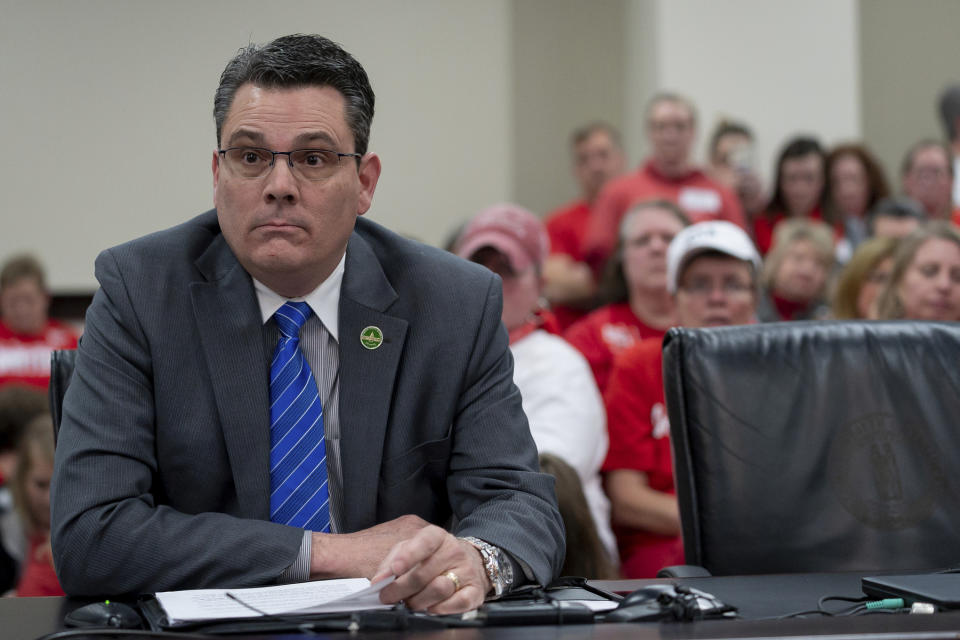 In a room packed with teachers, Kentucky State Representative Ken Upchurch speaks on a bill that will change how individuals are nominated to the Kentucky teachers retirement systems board of trustees, in Frankfort, Ky, Thursday, Feb 28, 2019. (AP Photo/Bryan Woolston)