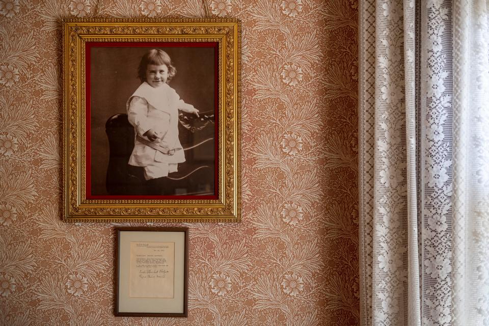 A portrait of 2-year-old John Steinbeck hangs inside The Steinbeck House in Salinas, Calif., on Wednesday, March 24, 2021. 