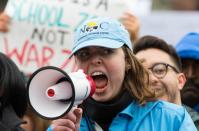 <p>Haley Zink, an organizer for the St. Louis March for Our Lives, shouts out chants during the March for Our Lives in downtown St. Louis on Saturday, March 24, 2018. (Austin Steele/Post-Dispatch/AP) </p>