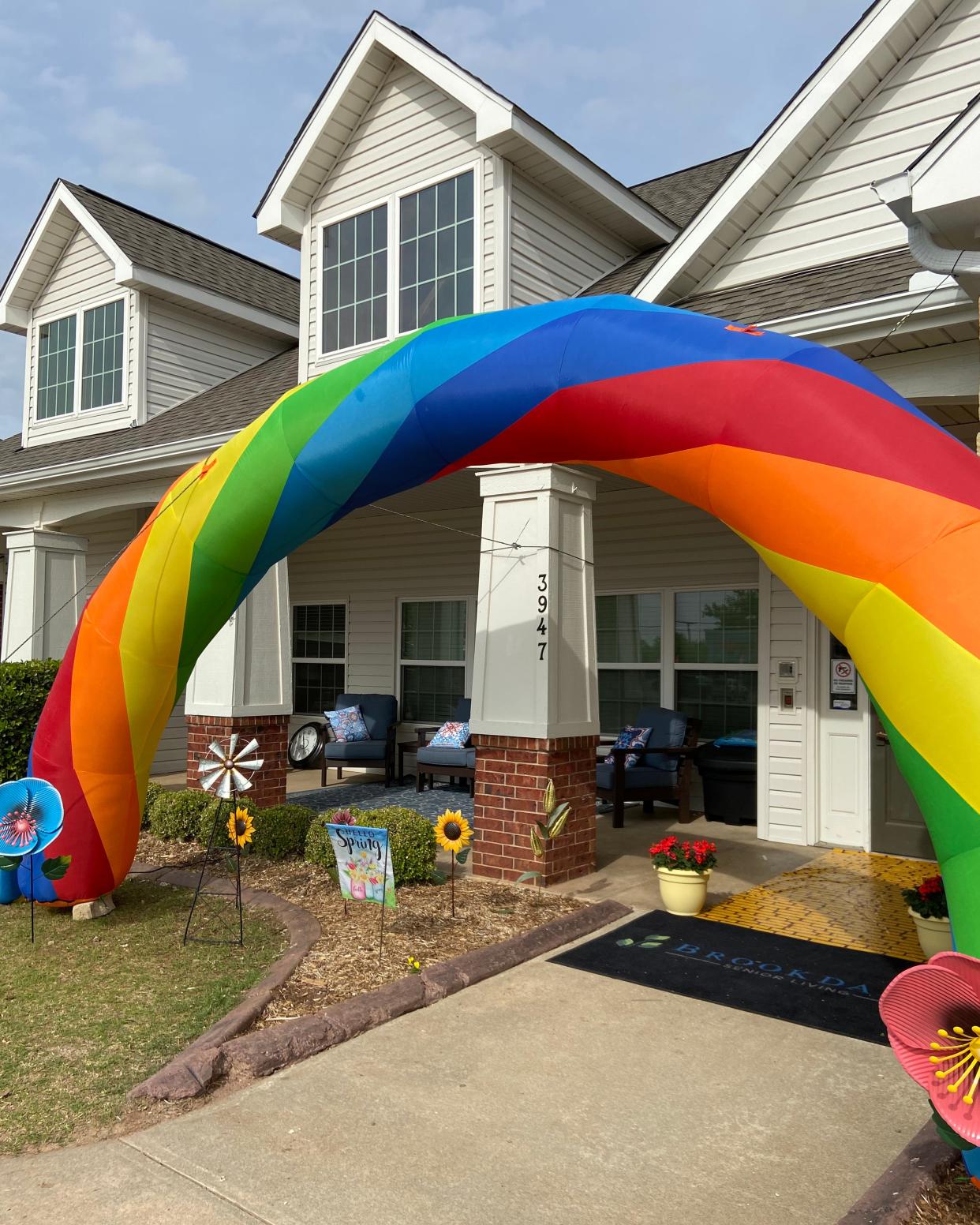 An inflatable rainbow and flowers were placed outside the Brookdale Shawnee assisted living center recently as part of a "Wizard of Oz"-themed party commemorating the one-year anniversary of a tornado that struck the facility and other portions of Shawnee.