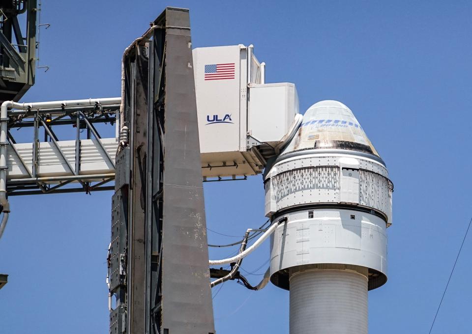 A United Launch Alliance Atlas V rocket and Boeing Starliner capsule remain on the launch pad May 7, the day after officials scrubbed a launch to the International Space Station.