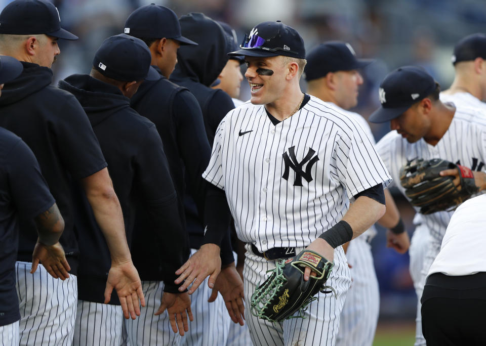 New York Yankees' Harrison Bader celebrates with teammates after defeating the Texas Rangers, Saturday, June 24, 2023, in New York. The Yankees won 1-0. (AP Photo/Noah K. Murray)
