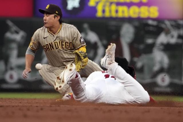 San Diego Padres' Garrett Cooper hits a home run during the sixth