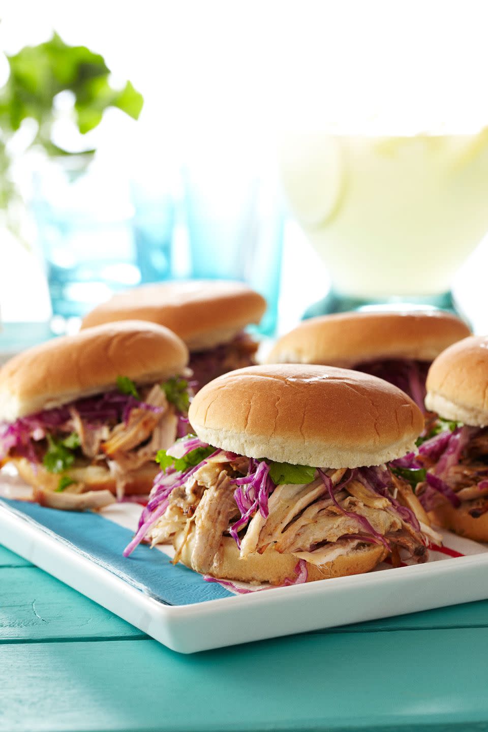 <p>It doesn't get much easier than these slow-cooked sandwiches topped with a quickie vinegar sauce. Looking for a challenge? We also have Bobby Flay's smoker instructions for the seasoned grill master. </p><p><a href="https://www.goodhousekeeping.com/food-recipes/a13789/pulled-pork-black-pepper-vinegar-recipe-ghk0712/" rel="nofollow noopener" target="_blank" data-ylk="slk:Get the recipe for Pulled Pork with Black Pepper Vinegar »;elm:context_link;itc:0;sec:content-canvas" class="link "><em>Get the recipe for Pulled Pork with Black Pepper Vinegar »</em></a></p>