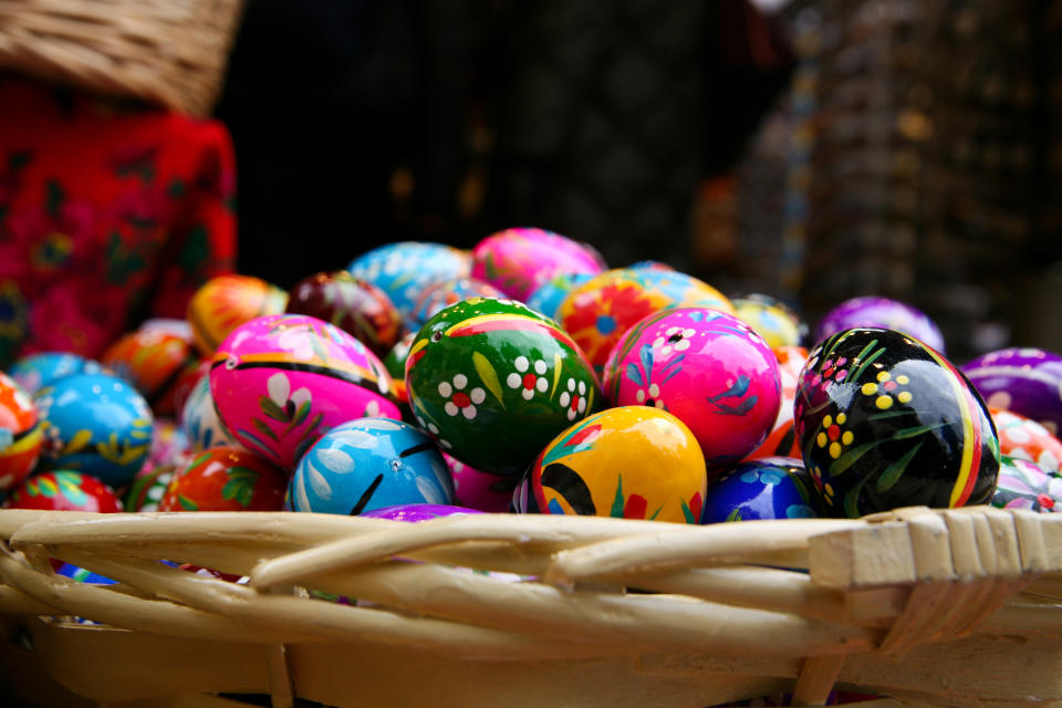 Basket of intricately patterned Easter eggs, displaying various traditional designs