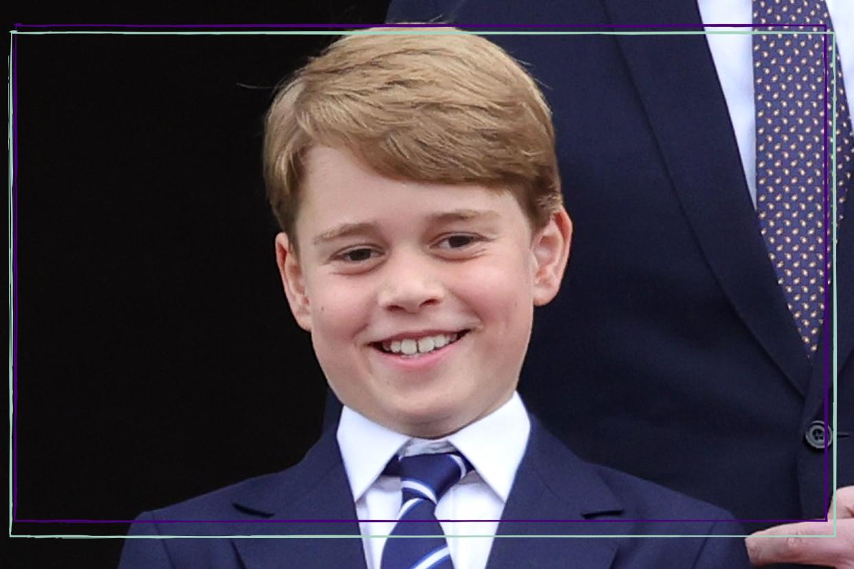  Prince George in suit and tie. 