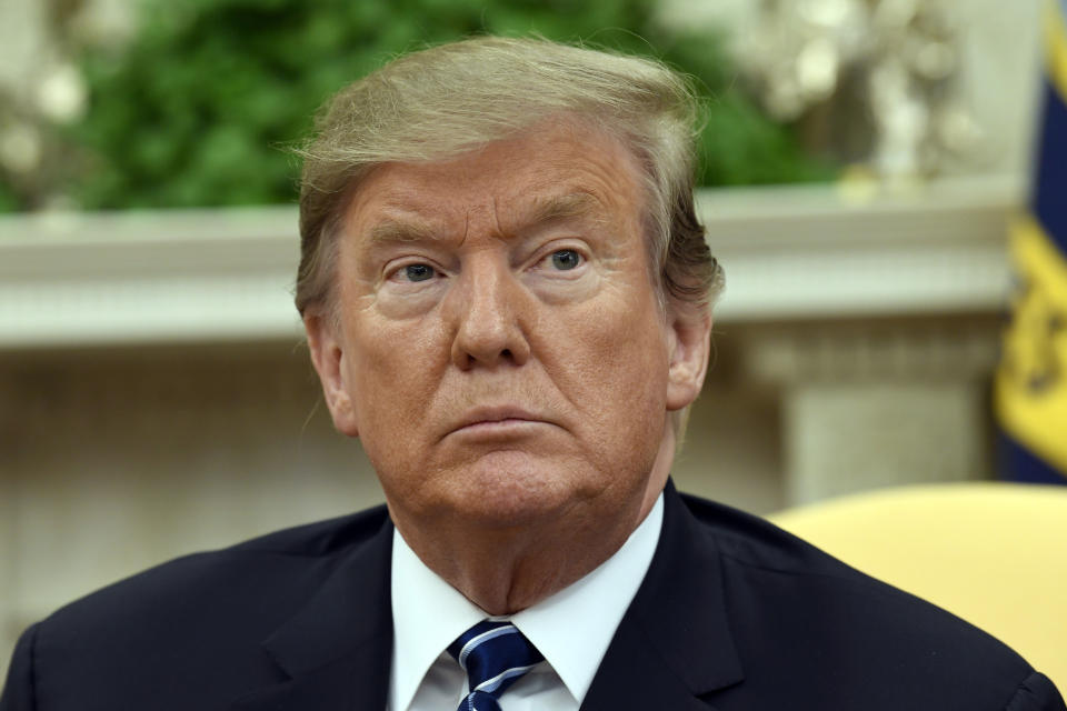 President Donald Trump listens during his meeting with Austrian Chancellor Sebastian Kurz in the Oval Office of the White House in Washington, Wednesday, Feb. 20, 2019. (AP Photo/Susan Walsh)